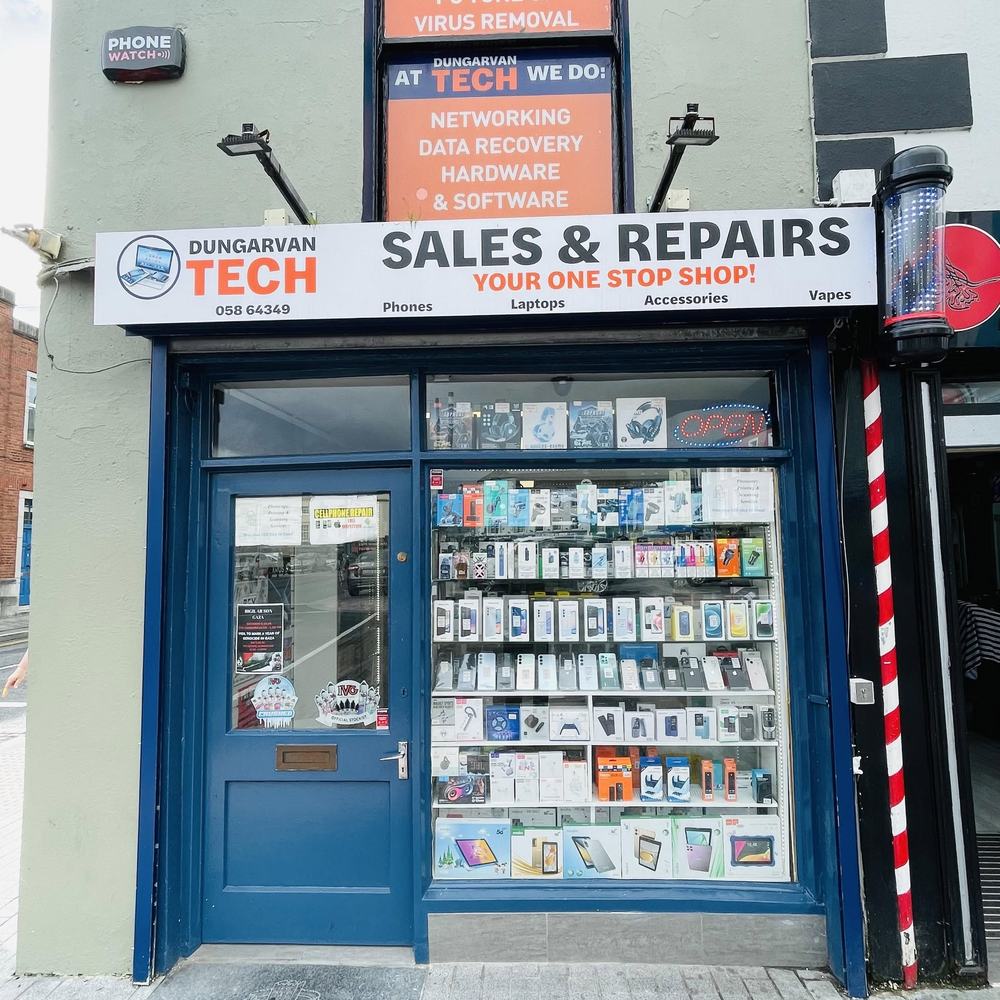 Dungarvan Tech shopfront on Saint Mary Street with phones, laptops and accessories in the window